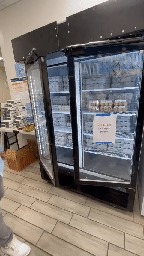 Food pantry refrigerator retrofitted with LED strip lighting